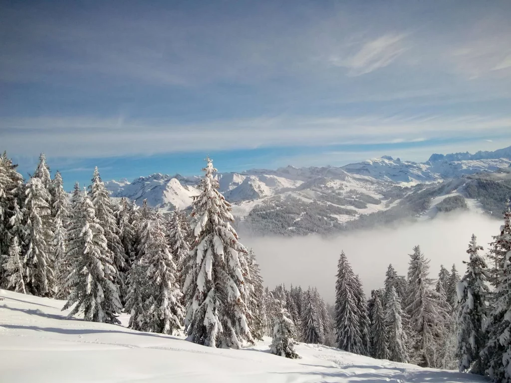 Snow-covered Morzine mountains viewed from above during winter